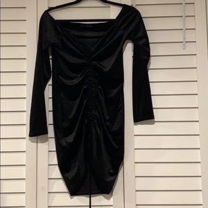 Long sleeve off the shoulder dress.